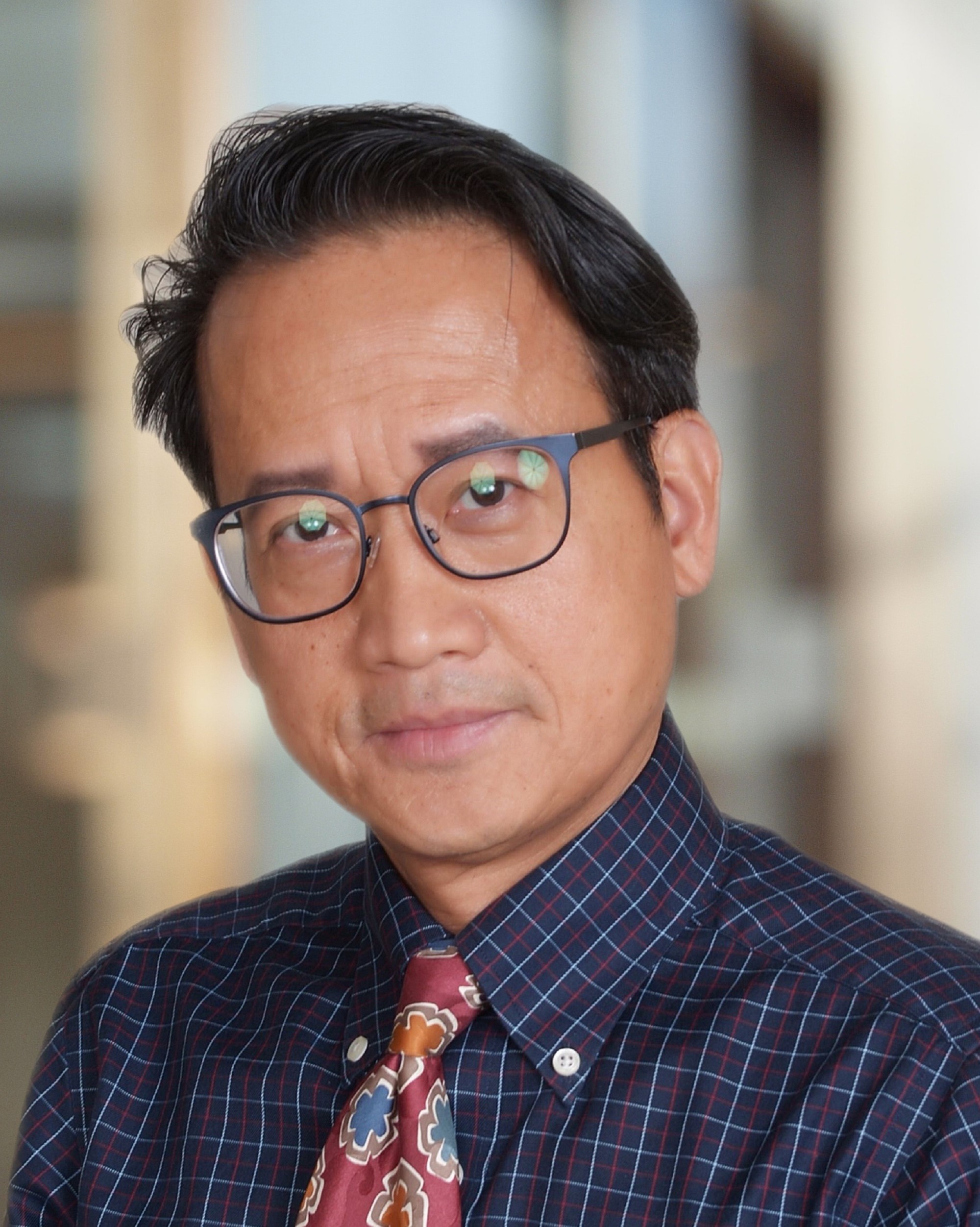Thanh K. Dang, MD - Noran Neurology (Facetune background & cropped).jpg